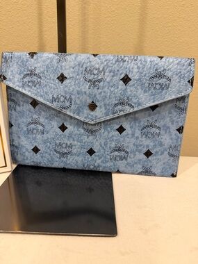 MCM Visetos envelope leather pouch clutch bag in a blue color